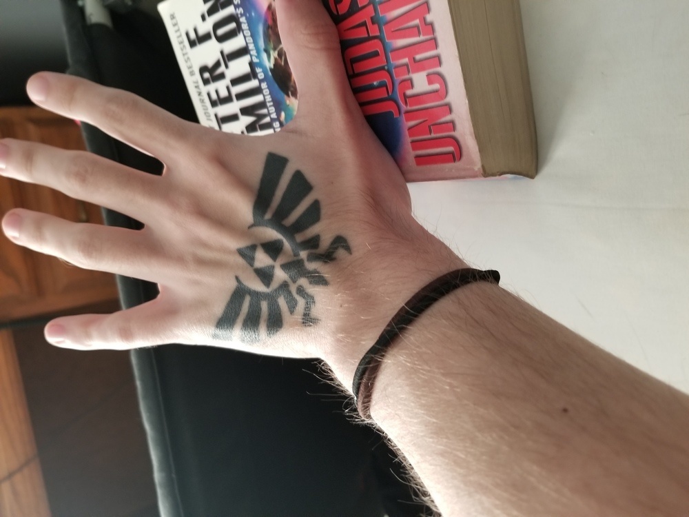 Sakura Tattoo  Zelda triforce hand tattoo by jtseronis         zeldatattoo zeldatriforce flames handtattoo  Facebook